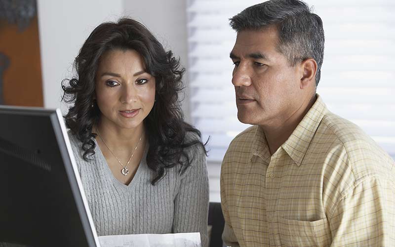 man-and-woman-concerned-about-checking-their-credit-scores